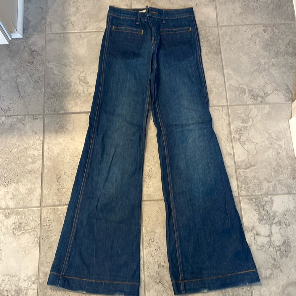 Zara flare leg jeans with distressed bottoms